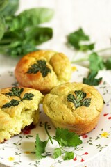 Patrick's Day Buns or muffins of green color with spinach juice of a trefoil of parsley leaves.