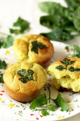 Patrick's Day Buns or muffins of green color with spinach juice of a trefoil of parsley leaves.