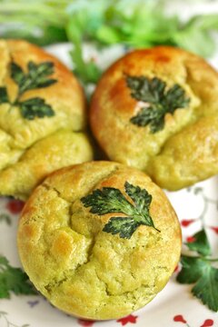 Patrick's Day Buns or muffins of green color with spinach juice of a trefoil of parsley leaves.