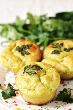 Patrick's Day Buns or muffins of green color with spinach juice of a trefoil of parsley leaves.