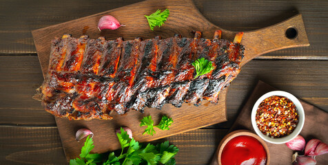 Grilled pork ribs on cutting board © nadin333