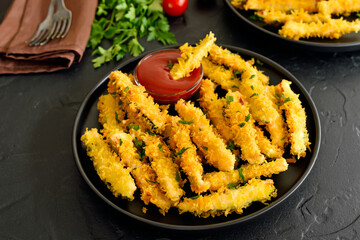 Fried zucchini sticks and tomato  sauce