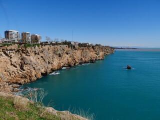 Fototapeta na wymiar touristic cliff city antalya in mediterranean turkey coastline by the mediterranean sea