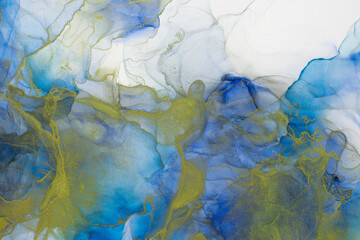Rich bright abstract picture. Luxury abstract fluid art painting alcohol ink. Background blue aquamarine gold sparkles.