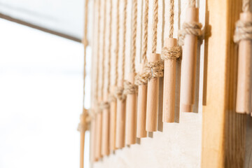 wooden handles hang on a rope, decor