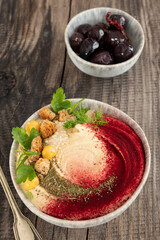 Chickpea hummus with beetroot powder. 