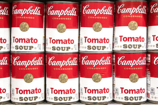 Los Angeles, CA/USA 6-21-2021 Can tins of Campbell's brand tomato soup full frame in a row