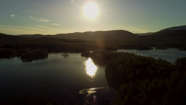 Sun Reflection Lake Sandvatn Fly Over Drone Sunset Norway 4K 30fps