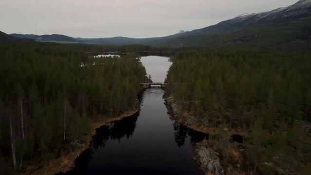 Late Landrover over Bridge Lake Holmevatn Mountain Forest Norway 4K 30fps