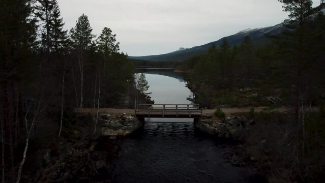 Follow Landrover Over Brige two lakes forest road norwegian mountain 4K 30fps