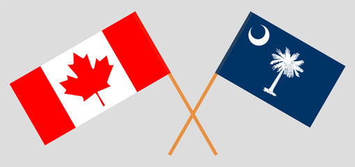 Crossed flags of Canada and The State of South Carolina. Official colors. Correct proportion