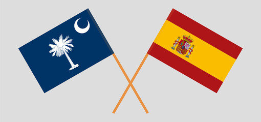 Crossed flags of The State of South Carolina and Spain. Official colors. Correct proportion