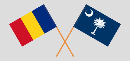 Crossed flags of Romania and The State of South Carolina. Official colors. Correct proportion