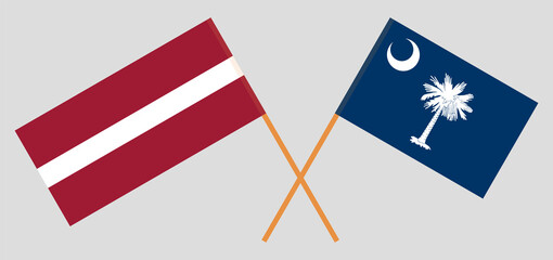 Crossed flags of The State of South Carolina and Latvia. Official colors. Correct proportion