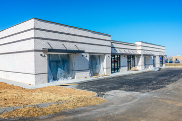 Obraz na płótnie Canvas New Construction Small Retail Strip Center
