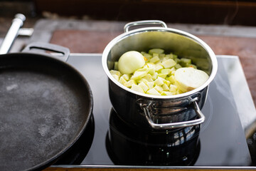 boiling potatoes in a saucepan, boiling potatoes on the stove