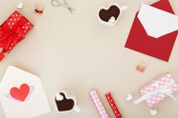 Concept gifts for your loved ones, for valentines day, womens day, mothers day or birthday. White and red envelopes with paper with space for text mock up. Copy space. Top view