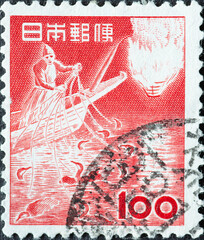Japan - circa 1953: a postage stamp from Japan, showing a man on the fishing boat doing cormorant fishing