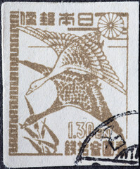 Japan - circa 1946: a postage stamp from Japan, showing two Wild Geese in flight
