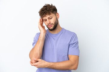 Young handsome caucasian man isolated on white background with headache