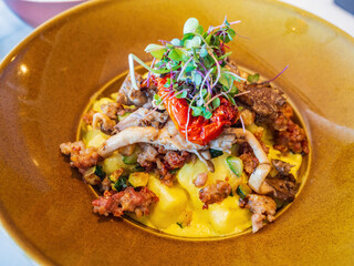 Close up shot of italian sausage and potato