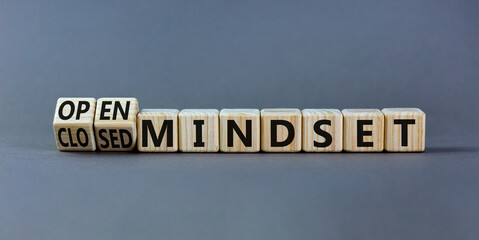 Open or closed mindset symbol. Turned wooden cubes and changed concept words closed mindset to open...