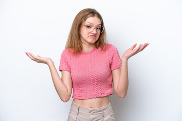 Teenager Russian girl isolated on white background having doubts while raising hands