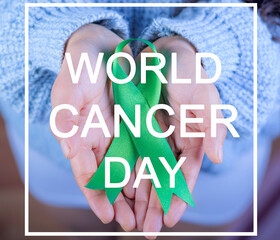 Girl holding green ribbon in support of liver and adrenal cancer, Text with the legend 