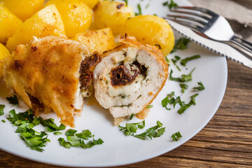 Chicken breast stuffed with cheese and dried tomatoes.