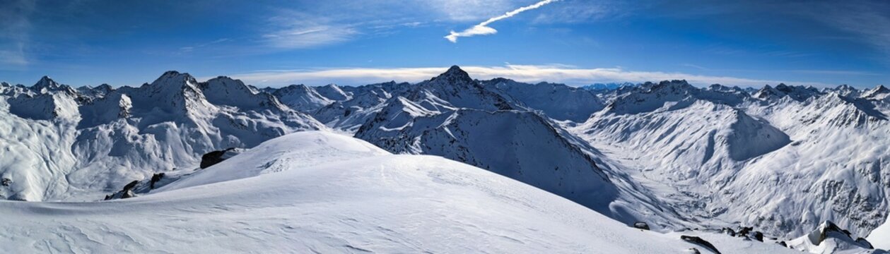 Skitour on the sentisch horn. Mountaineering in a wonderful mountain world in davos switzerland. snowy mountain peaks