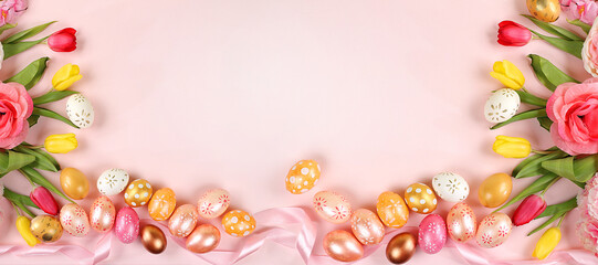 Festive easter banner,spring composition with decorated homemade eggs and blooming flowers,creative...