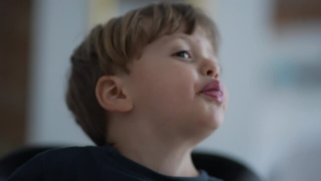 Child showing tongue misbehaving  kid sticking tongue out