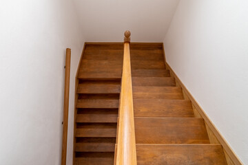 Contemporary wood stairway. Interior wooden stairs. Staircase going down. Pathway of stairway or...