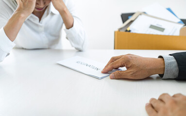 Hand of employer filing final remuneration after employee to write a document letter of resignation, resign concept