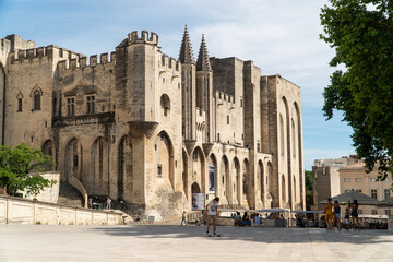 Avignon, Vaucluse - France - July 10 2021: Facade of Palais des papes in Avignon.