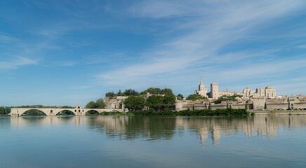 Fototapeta na wymiar Avignon, Vaucluse - France - July 10 2021: Roine river with Palais des papes and 