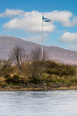 Fototapeta na wymiar Scottish flag waving in the wind