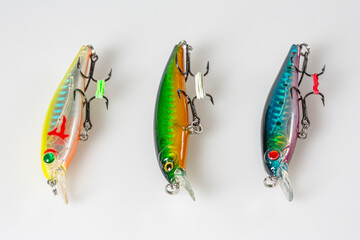 Fishing Lure (Wobbler) fishing temptations on white background. Many Fishing Spinning, fake bait,...
