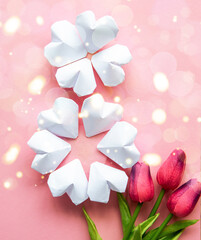paper hearts shape figure eight 8 and flowers background. happy International Women’s Day celebrate on March 8 card.