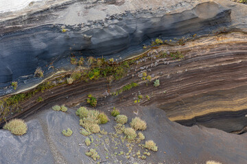Close-up view of different layers of volcanic ashes at La Tarta, Teide National Park, Tenerife,...