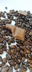 vertical photo, coffee beans and a piece of chocolate, flat layout