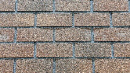 Abstract background in the form of roofing material of different shapes. 