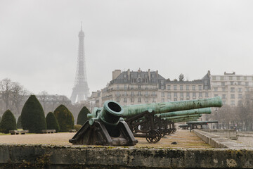 Fototapeta na wymiar Invalides Garden with cannons view Eiffel tower