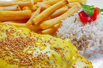 filet mignon with melted cheese rice and fries