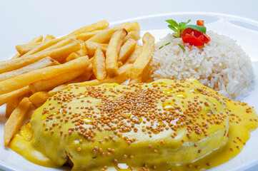 filet mignon with melted cheese rice and fries
