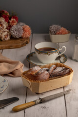 Fresh brioche in a wooden wrapping