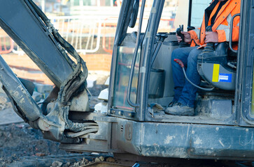 Excavator driver at work