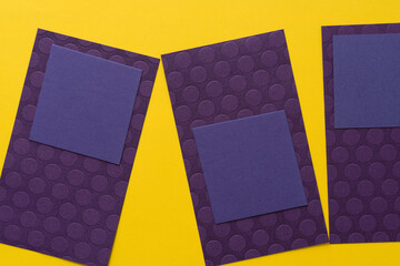 purple paper squares and rectangles on yellow