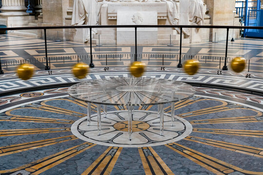 Paris, France - June 14 2021: Foucault pendulum moving in the Pantheon de Paris. It was conceived by Leon Foucault in 1851 as an experiment to demonstrate the Earth's rotation.