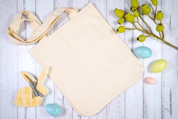 Tote bag flat lay mockup. Happy Easter farmhouse theme SVG craft product mockup styled with wooden...
